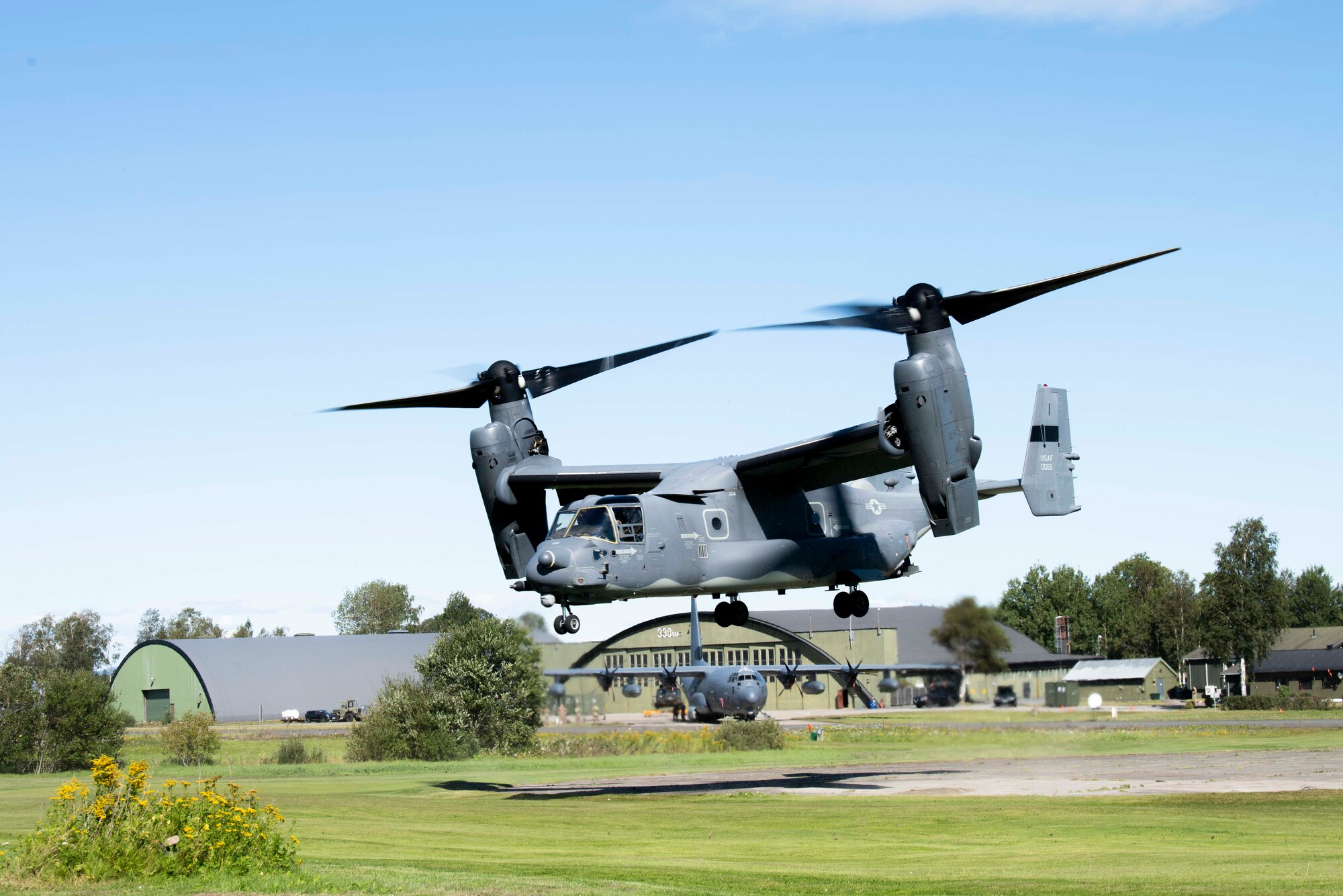 A CV-22B Osprey, based out of RAF Mildenhall, U.K., takes off from Rygge Air Station, Norway, during a training mission on August 25, 2020. Integration with the Royal Norwegian Air Force allowed the 352 SOW to enhance and strengthen bonds with our partner nation and further secure the strategic high-north region. The exercise provided training for 352d Special Operations Wing members on capa-bilities such as personnel recovery, forward area refueling point, aerial refueling, maritime craft delivery system, and fast rope training. (U.S. Air Force photo by Staff Sgt. Michael Washburn)