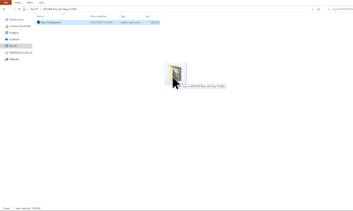 Screenshot of Adobe Lightroom with the project folder highlighted inside disc drive folder.