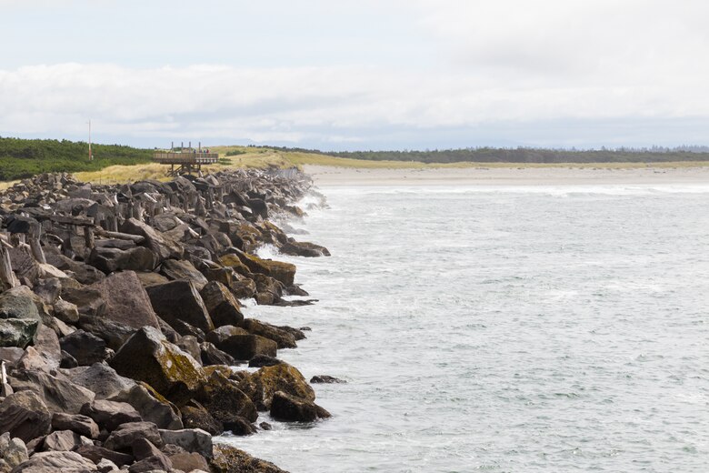 Waves crash against South Jetty at the Mouth of the Columbia River, near Hammond, Ore., Aug. 31. During violent winter storms, waves taller than the length of six king-sized beds stacked end-to-end (40 feet) can meet the Columbia River as it makes its way out to the Pacific Ocean. A system of three jetties makes passage safer. (U.S. Army photo by Jeremy Bell)