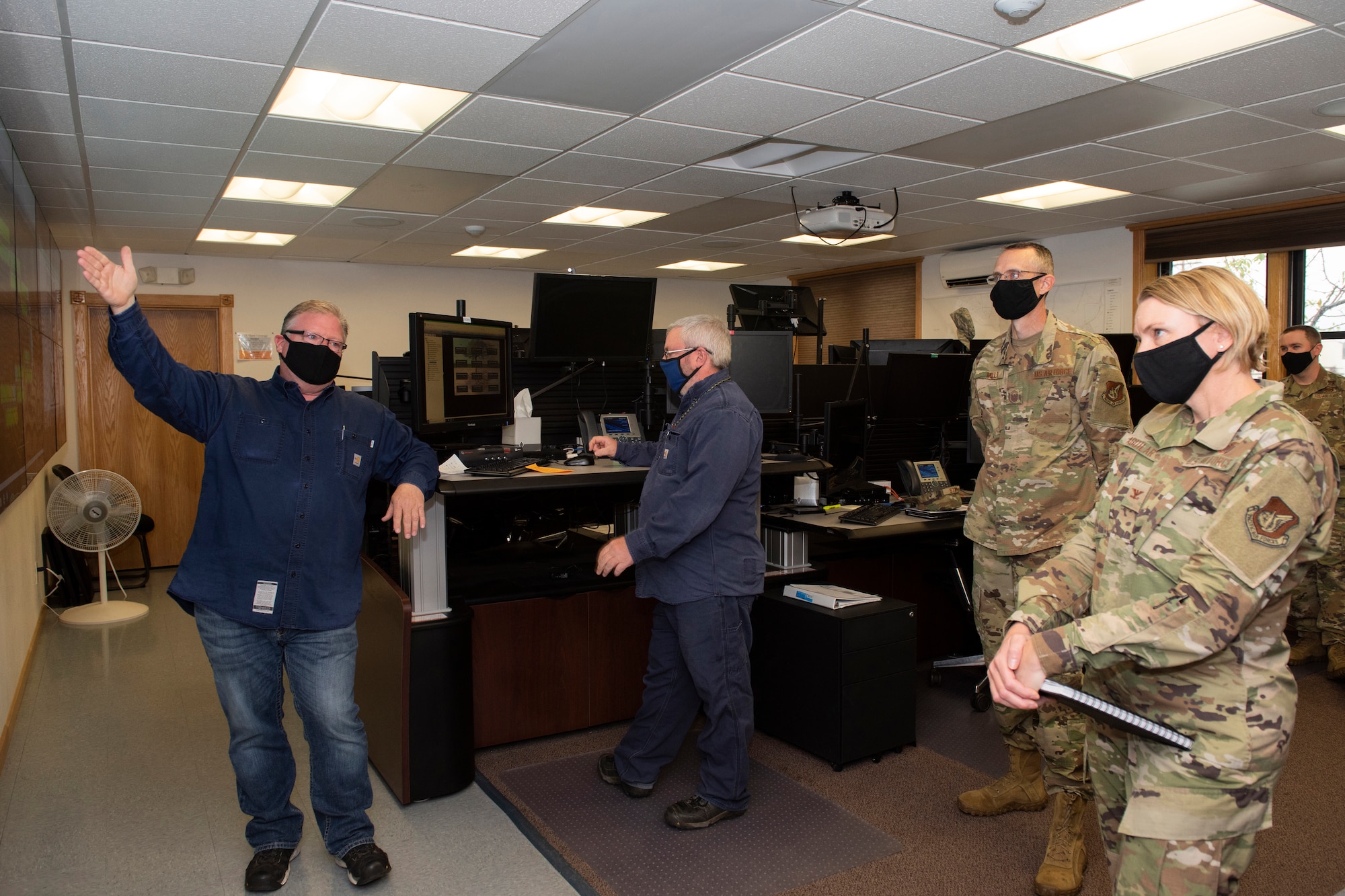 John Elsholz, a 773d Civil Engineer Squadron facility control systems supervisor, briefs U.S. Air Force Col. Kirsten Aguilar, Joint Base Elmendorf-Richardson and 673d Air Base Wing commander, on industrial control systems during a 773d CES immersion tour at JBER, Alaska, Sept. 1, 2020. Aguilar familiarized herself with the 773d CES and its role in supporting installation readiness after taking command of the installation on July 14, 2020. The 773d CES maintains structures throughout the base as well as runs the installation’s emergency management program.