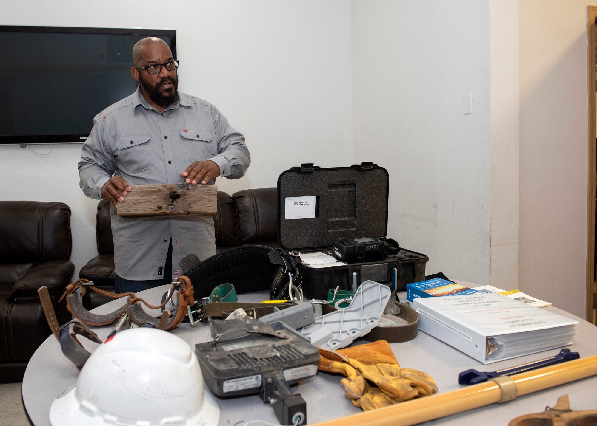 Lance Davis, 773d Civil Engineer Squadron high voltage supervisor, explains the potential dangers of electrical systems during a 773d CES immersion tour at JBER, Alaska, Sept. 1, 2020. Aguilar familiarized herself with the 773d CES and its role in supporting installation readiness after taking command of the installation on July 14, 2020. The 773d CES maintains structures throughout the base as well as runs the installation’s emergency management program.