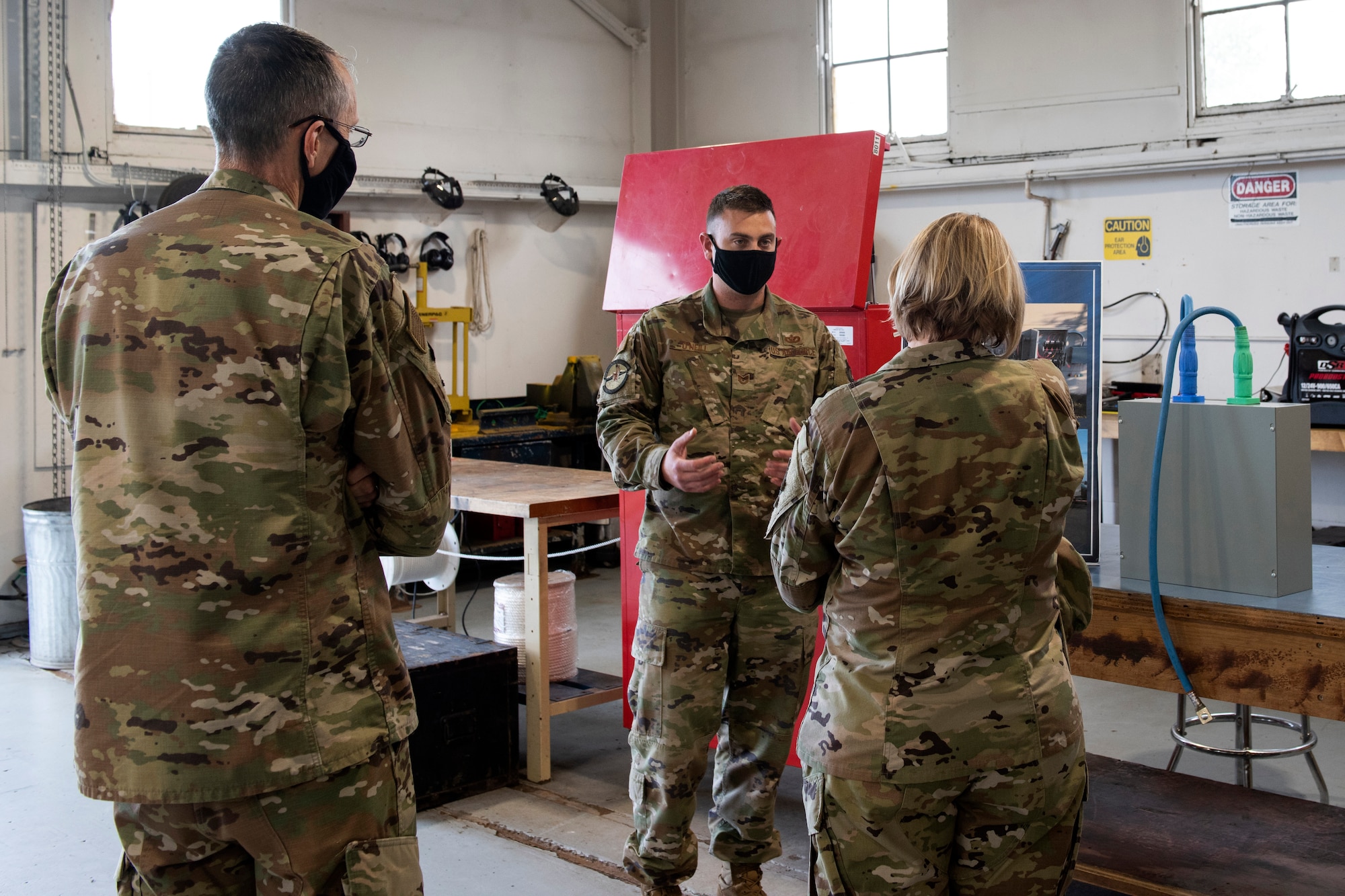 U.S. Air Force Tech. Sgt. Jared O’Neill, 773d Civil Engineer Squadron electrical power productions craftsman, briefs U.S. Air Force Col. Kirsten Aguilar, Joint Base Elmendorf-Richardson and 673d Air Base Wing commander, and U.S. Air Force Chief Master Sgt. Lee Mills, left, JBER and 673d ABW command chief, on power production’s innovation projects during a 773d CES immersion tour at JBER, Alaska, Sept. 1, 2020. Aguilar familiarized herself with the 773d CES and its role in supporting installation readiness after taking command of the installation on July 14, 2020. The 773d CES maintains structures throughout the base as well as runs the installation’s emergency management program.