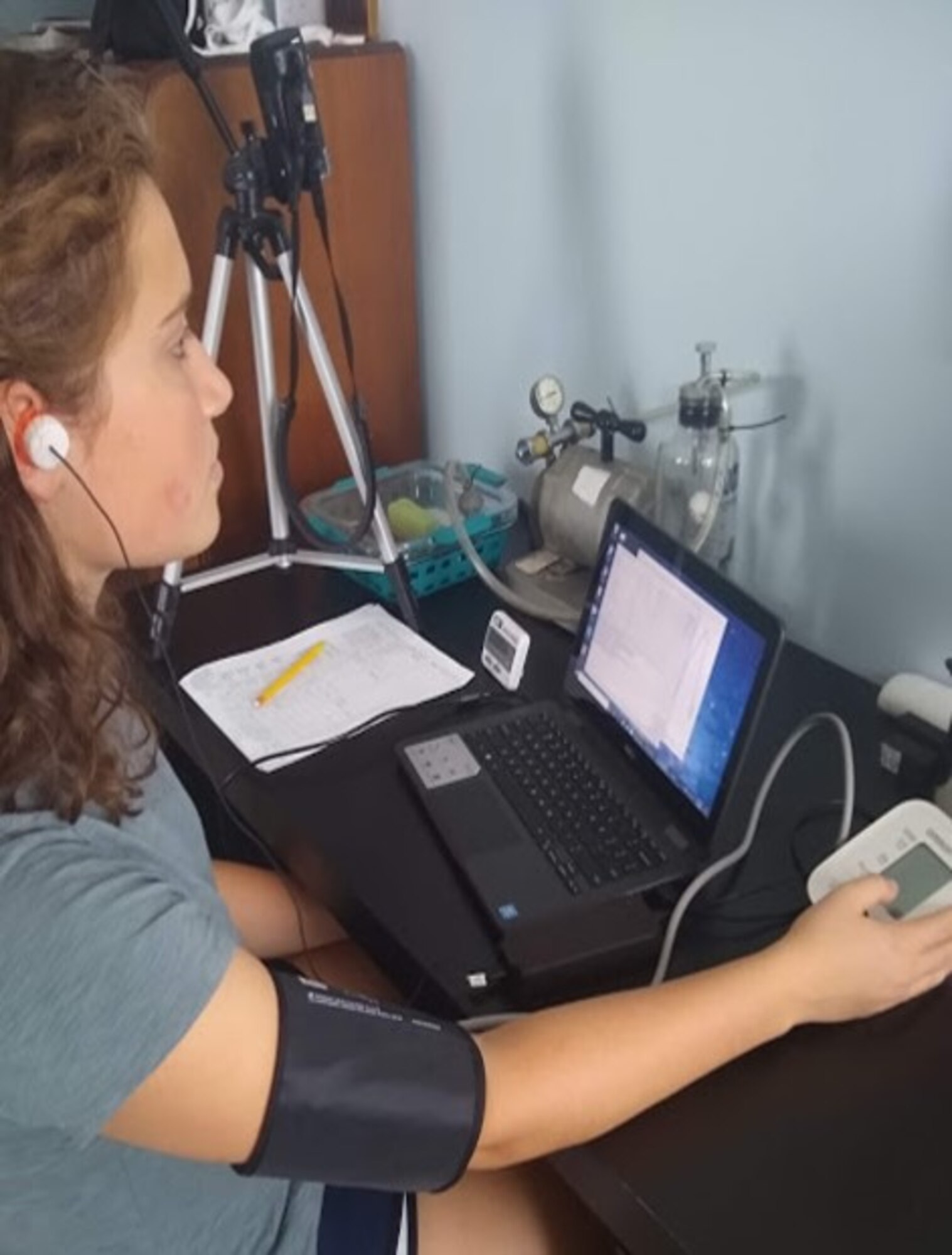 A student intern teleworking on a project involving acceleration and altitude research for her mentor at the 711th Human Performance Wing. (Courtesy photo)