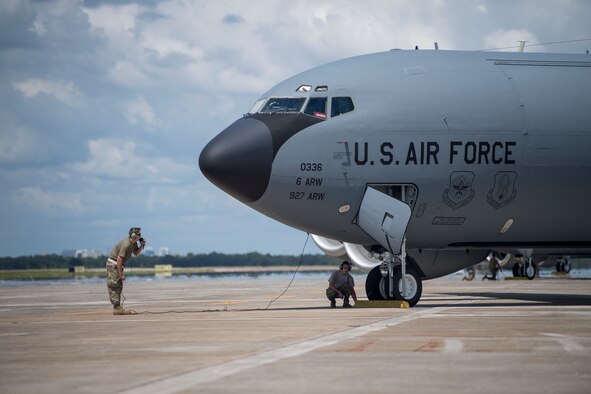 Flying crew chiefs with the 6th Air Mobility Wing quickly ready their aircraft for takeoff during a joint training exercise at MacDill Air Force Base, Fla., Aug. 29, 2020.