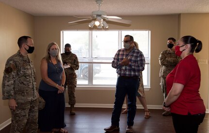 Javier Cardenas briefing the wing commander about housing.