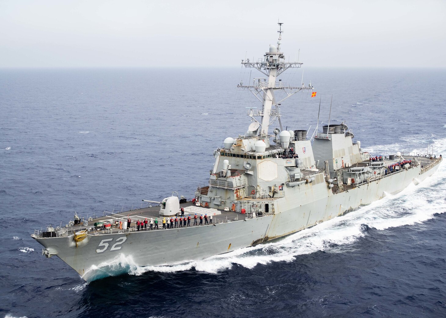 PHILIPPINE SEA (May 30, 2020) The guided-missile destroyer USS Barry (DDG 52) steams alongside the Navy’s only forward-deployed aircraft carrier USS Ronald Reagan (CVN 76) during a replenishment-at-sea. Ronald Reagan, the flagship of Carrier Strike Group 5, provides a combat-ready force that protects and defends the United States, as well as the collective maritime interests of its allies and partners in the Indo-Pacific region. (U.S Navy photo by Mass Communication Specialist 1st Class Janweb B. Lagazo)