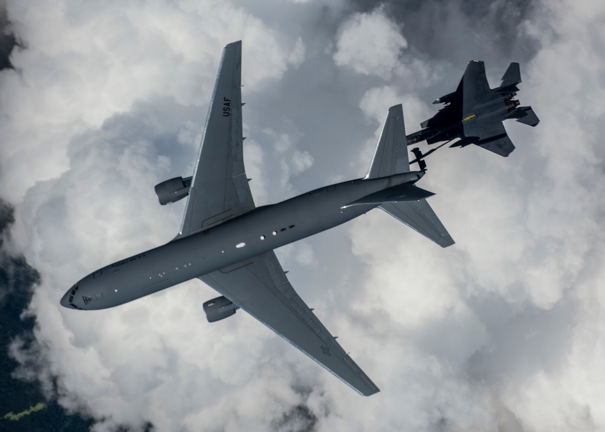 A KC-46 Pegasus from the 916th Air Refueling Wing air-to-air refuels an F-15E Strike Eagle from the 336th Fighter Squadron at Seymour Johnson Air Force Base over the skies of North Carolina.