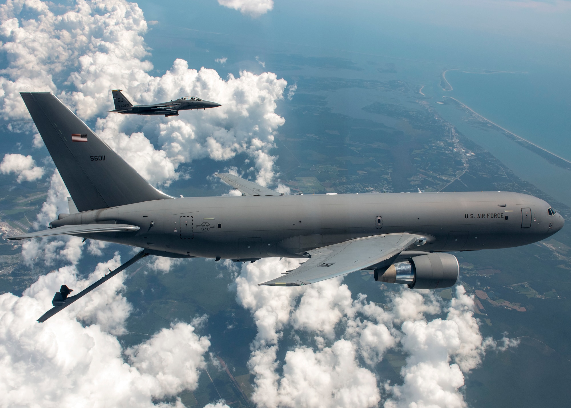 A KC-46 Pegasus from the 916th Air Refueling Wing and an F-15E Strike Eagle from the 336th Fighter Squadron at Seymour Johnson Air Force Base fly in the sky over North Carolina.