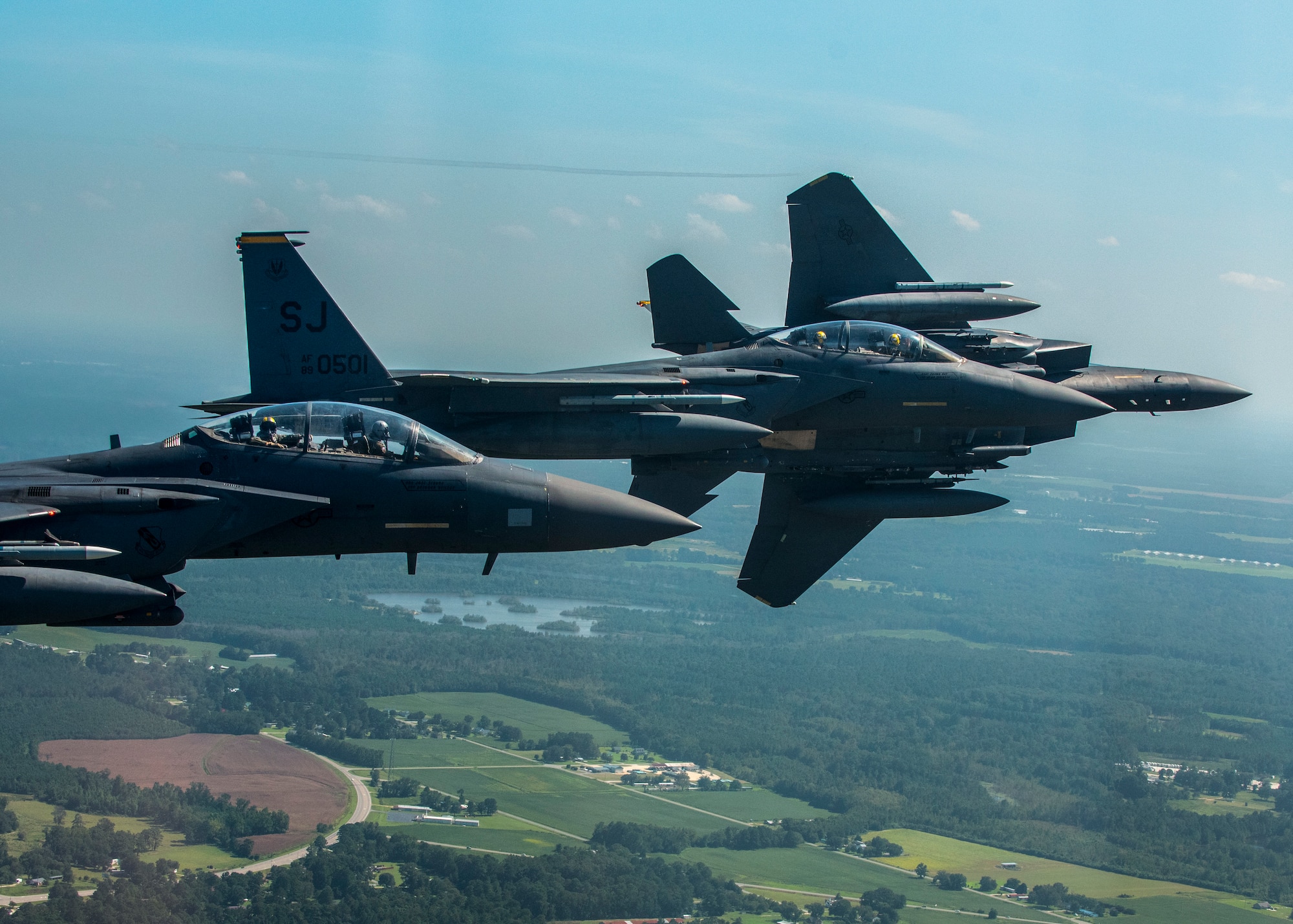 An F-15E Strike Eagles from the 336th Fighter Squadron at Seymour Johnson Air Force Base breaks out of formation as the fly in the sky over North Carolina
