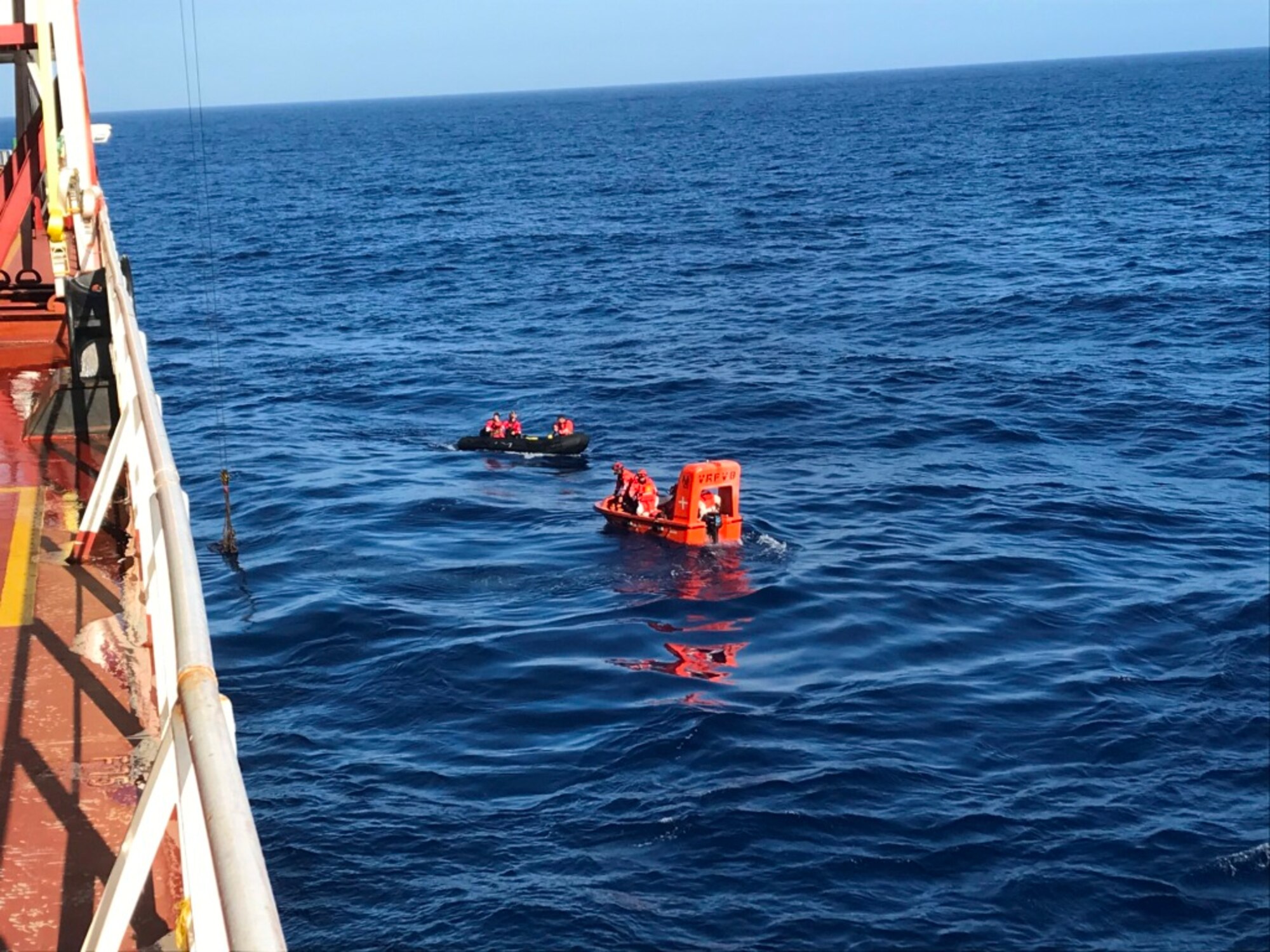 U. S. Coast Guard Search and Rescue team members prepare to board the Chinese flagship, Ocean Applaud, Aug. 27, 2020, off the coast of California.