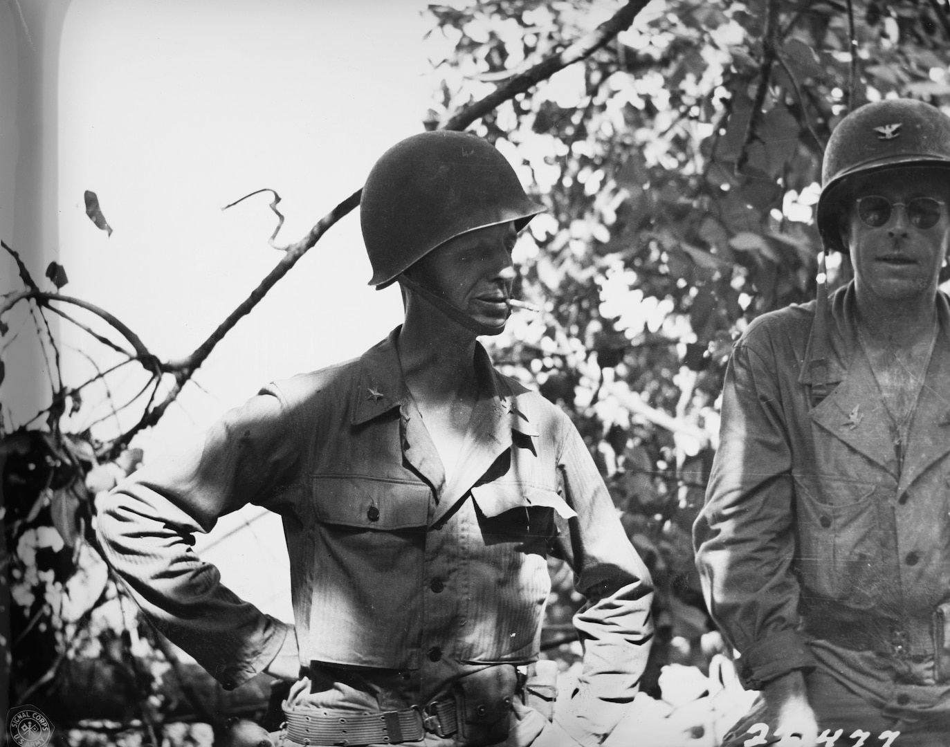 Brig. Gen. Robert McBride Jr., left, and Col. J.S. Bradley in the field near Teterei, New Guinea, Feb. 22, 1944. U.S. Army Signal Corps photo by Pvt. Ira Rosenberg