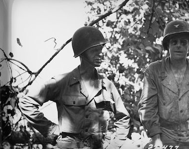 Brig. Gen. Robert McBride Jr., left, and Col. J.S. Bradley in the field near Teterei, New Guinea, Feb. 22, 1944. U.S. Army Signal Corps photo by Pvt. Ira Rosenberg