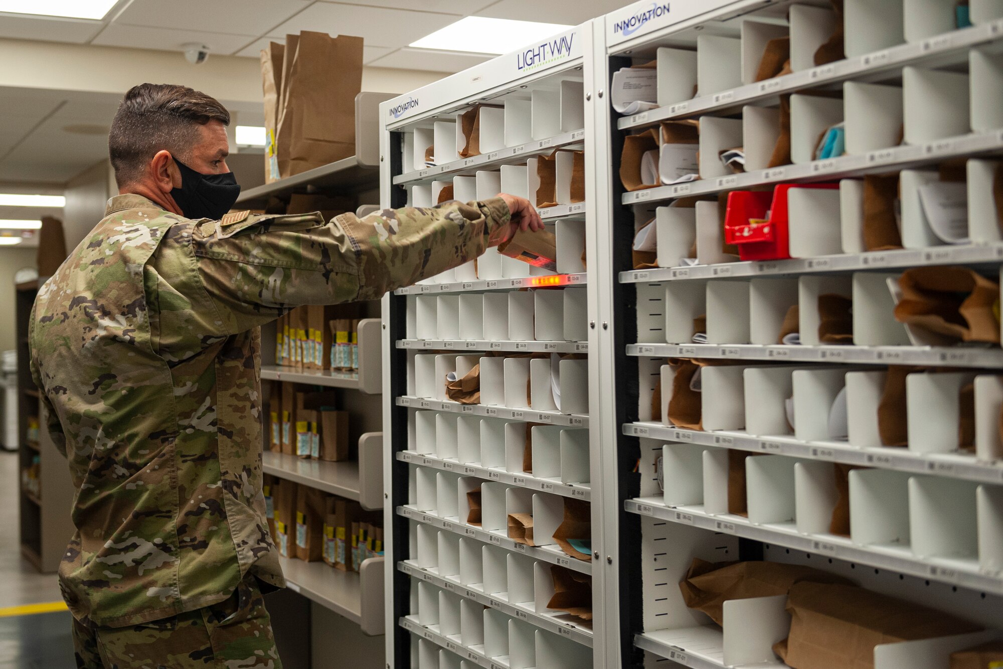 Photo of Chief Wilfong grabbing a prescription