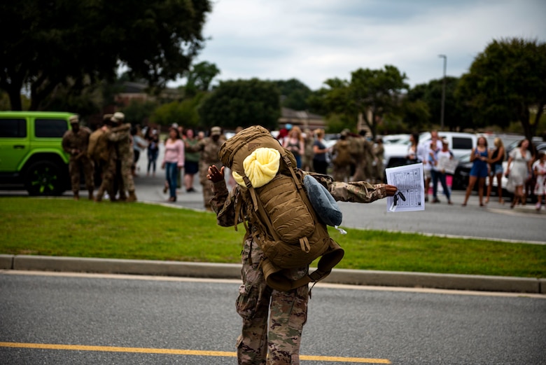 Photo of Airmen reuniting with loved ones.