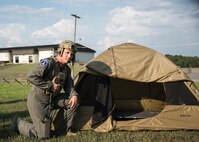 A photo of Airmen setting up equipment