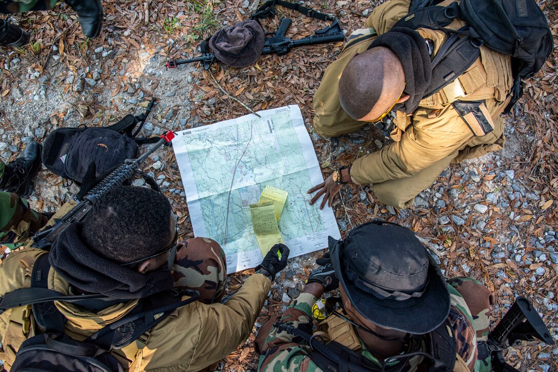 Partner-nation students from Nigeria and Sierra Leone conduct land navigation and reconnaissance tactics at John C. Stennis Space Center, November 20, 2019 (U.S. Navy/Michael Williams)