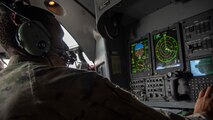 A combat systems officer assigned to the 1st Special Operations Squadron navigates off the Northern Coast of Japan, Aug. 5, 2020, during Exercise Gryphon Jet 10. Gryphon Jet is an integrated training exercise focused on improving interoperability throughout the special operations community. During this exercise formation departure, ship based air traffic control procedures, night vision goggle mountain low level, air intercepts with F/A-18s and tilt-rotor air-to-air refueling with the CV-22 were simulated. (U.S. Air Force photo by Airman 1st Class China M. Shock)