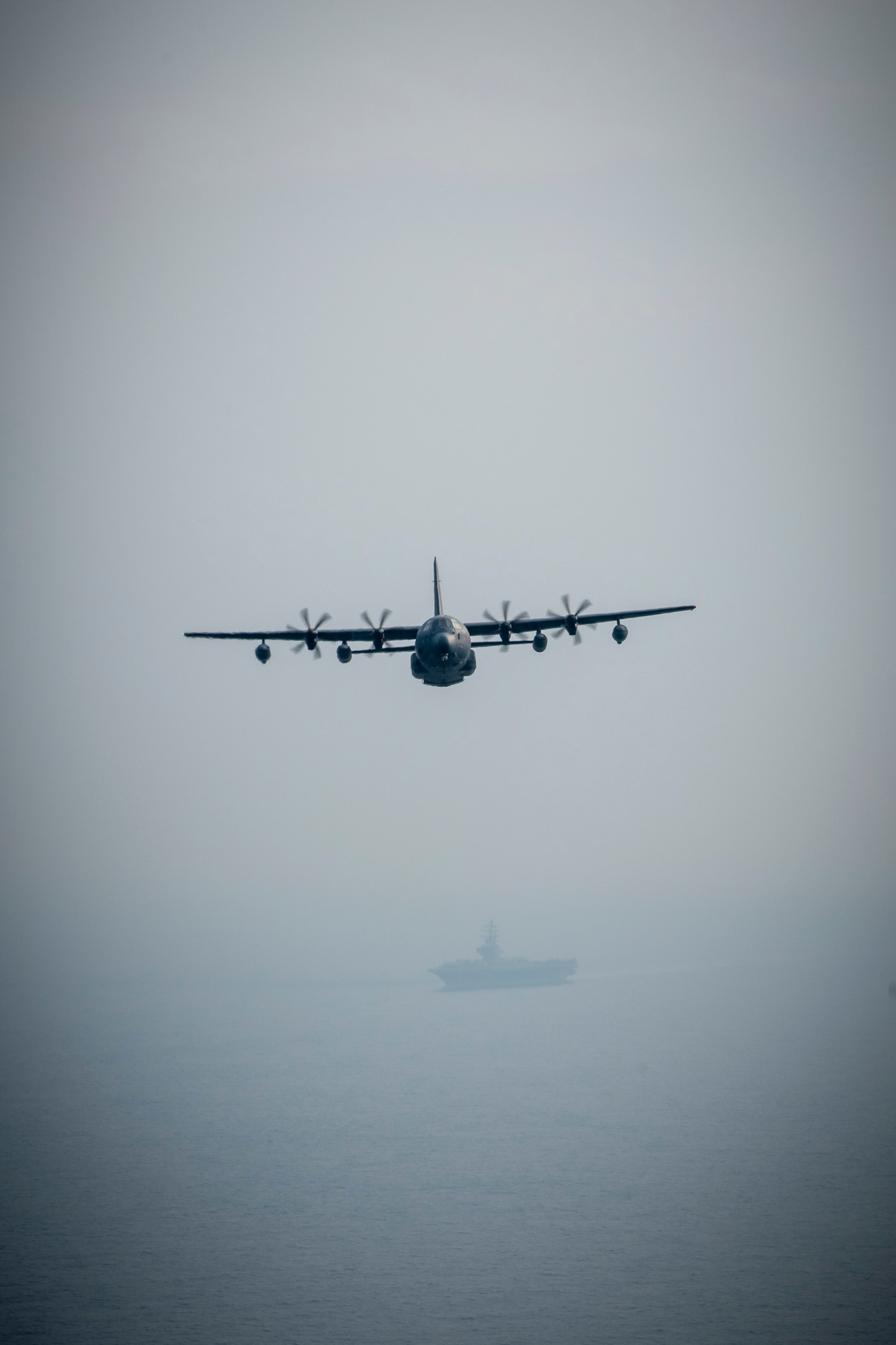 A U.S. Air Force MC-130J soars off the Northern Coast of Japan, Aug. 5, 2020, during Exercise Gryphon Jet 10. Gryphon Jet is an integrated training exercise focused on improving interoperability throughout the special operations community. During this exercise formation departure, ship based air traffic control procedures, night vision goggle mountain low level, air intercepts with F/A-18s and tilt-rotor air-to-air refueling with the CV-22 were simulated. (U.S. Air Force photo by Airman 1st Class China M. Shock)