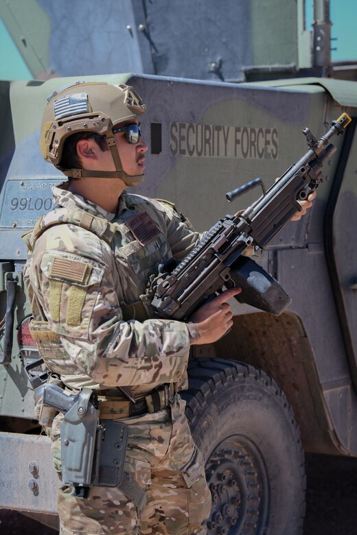 Defender with weapon