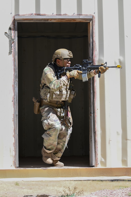 Defender exiting building