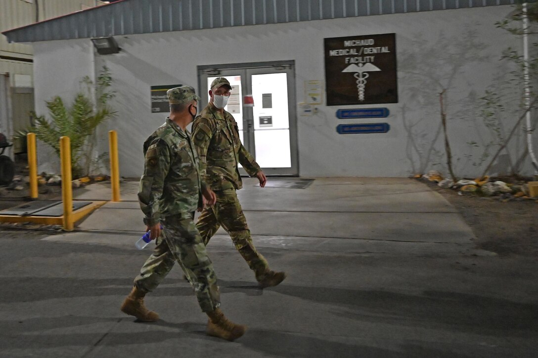 U.S. Air Force Gen. Jeffrey L. Harrigian, U.S. Air Forces in Europe and Air Forces Africa commander meets with Col. Ryan Bohner, 449th Air Expeditionary Group commander after arriving at Camp Lemonnier, Djibouti, September 1, 2020. The 449th AEG conducts personnel recovery and other operations in support of activities to enable U.S. Air Forces Africa and Combined Joint Task Force-Horn of Africa. (U.S. Air Force photo by Staff Sgt. Dana J. Cable)