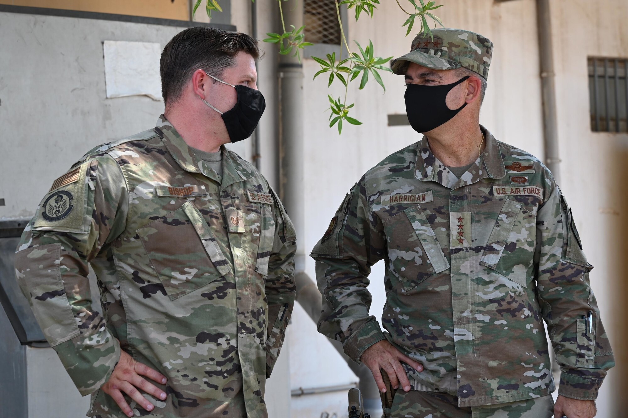 U.S. Air Force Gen. Jeffrey L. Harrigian, U.S. Air Forces in Europe and Air Forces Africa commander, meets with Tech Sgt. Charles Bishop, 726th Expeditionary Air Base Squadron material management flight NCOIC, at Camp Lemonnier, Djibouti, September 1, 2020. Harrigian visited with U.S. Air Force members in Djibouti and East Africa to gain insight into their integrated missions, and the multiple roles of Airmen in the joint environment. (U.S. Air Force photo by Staff Sgt. Dana J. Cable)