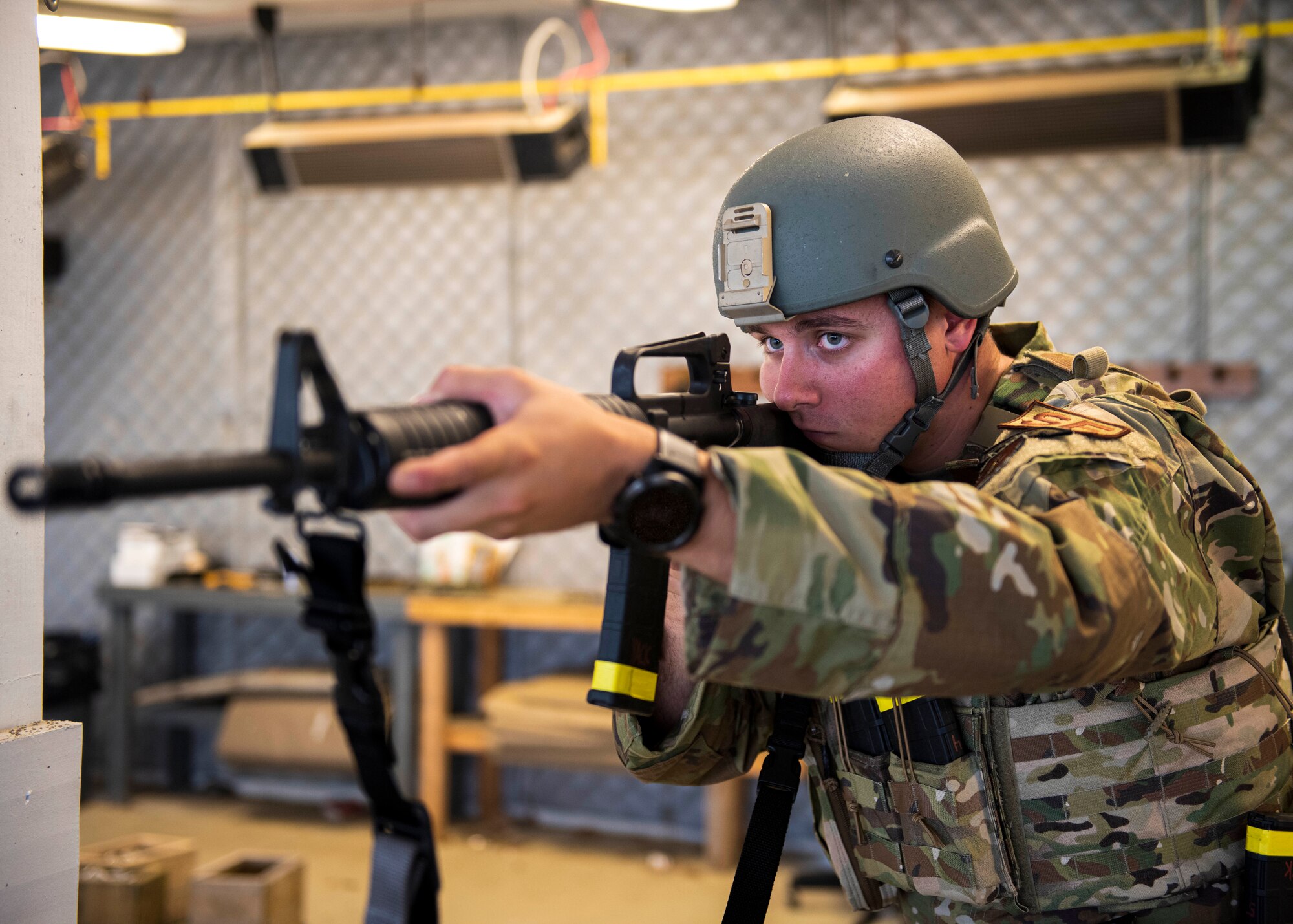 Pennsylvania Air National Guardsman Staff Sgt. Nicholas Yackovich assigned to the 171st Air Refueling Wing’s Security Forces Squadron simulates shooting a M4 carbine for a photo Sept. 3, 2020, Pittsburgh, Pennsylvania.  Yackovich recently placed in the Governor's Twenty, took first place with his team at the Adjutant General's Combined Arms Match and first in the team pistol event at the Marksmanship Advisory Council Region 2 Match. (U.S. Air National Guard photo by Senior Airman Zoe M. Wockenfuss)