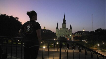 Sgt. 1st Class Yasmin Boneta, senior mortuary affairs adviser for the 377th Theater Sustainment Command, pauses to look out over Jackson Square in downtown New Orleans, Sept. 1, 2020.