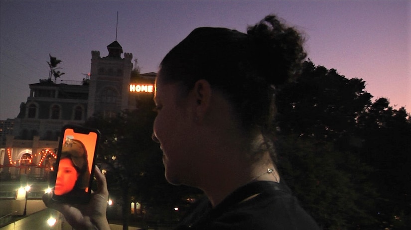 Sgt. 1st Class Yasmin Boneta, the senior mortuary affairs adviser for the 377th Theater Sustainment Command, spends a few minutes talking to her son over a video call in downtown New Orleans, La., Sept. 1, 2020.