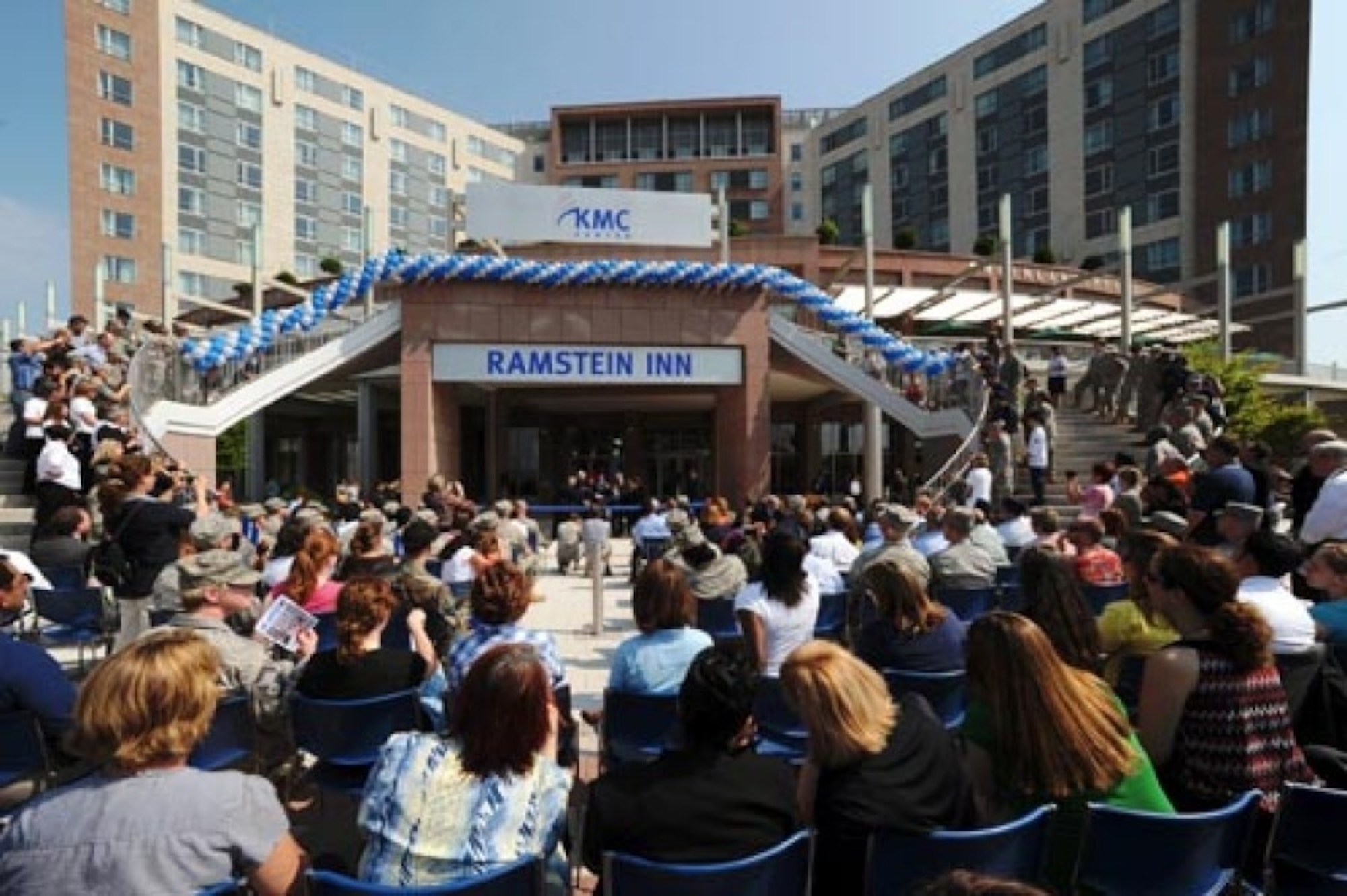 On July 2, 2009, onlookers attended a ribbon cutting ceremony to open a portion of the Kaiserslautern Military Community Center six years after ground was broken on the site. (Stars and Stripes photo)