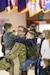 Alaska Army Guardsmen from the 297th Military Police Company visit with friends and family members following a deployment ceremony at the Alaska National Guard Armory on Joint Base Elmendorf-Richardson, Alaska, March. 13, 2019. Approximately 80 Alaska Guardsmen from the 297th Military Police Company are deploying to the U.S. Central command area of responsibility in support of Operations Spartan Shield for about nine months. (U.S. Army National Guard photo by 2nd Lt. Balinda O’Neal Dresel)
