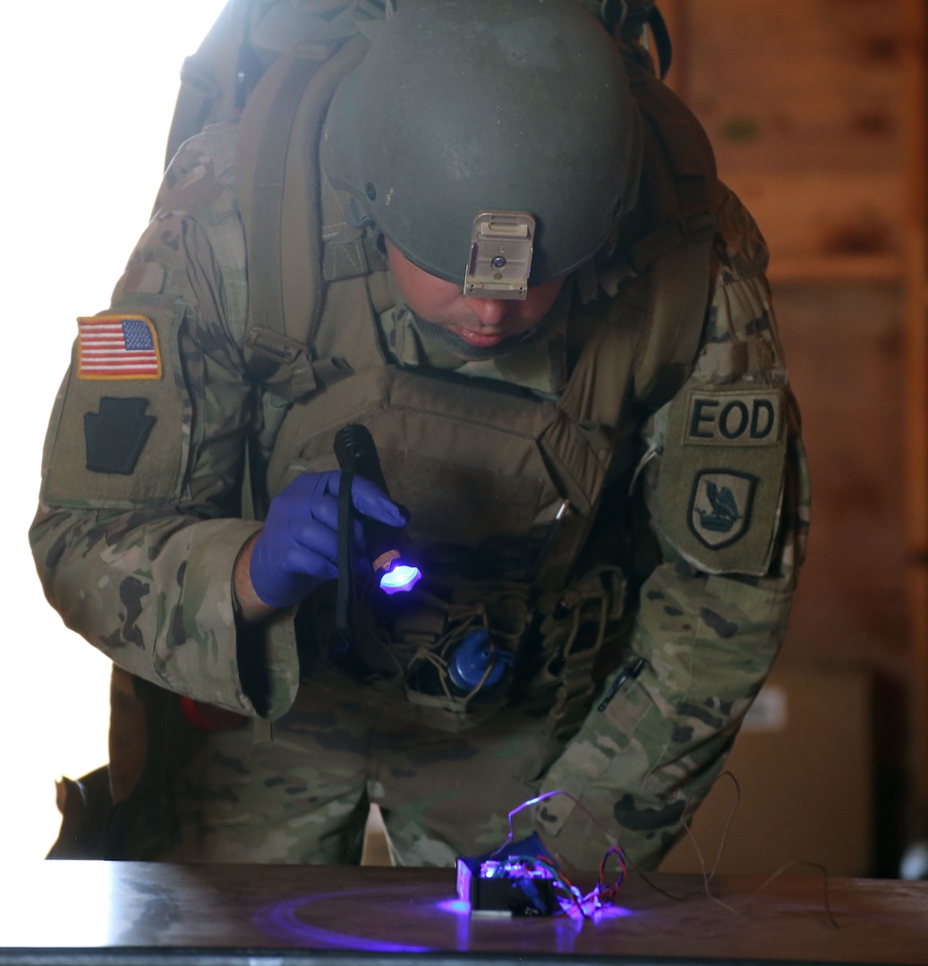 The Washington National Guard's 319th Explosive Ordnance Disposal Company conducts a known bomb-making site inspection training lane at Yakima Training Center during 2020 pre-mobilization training.