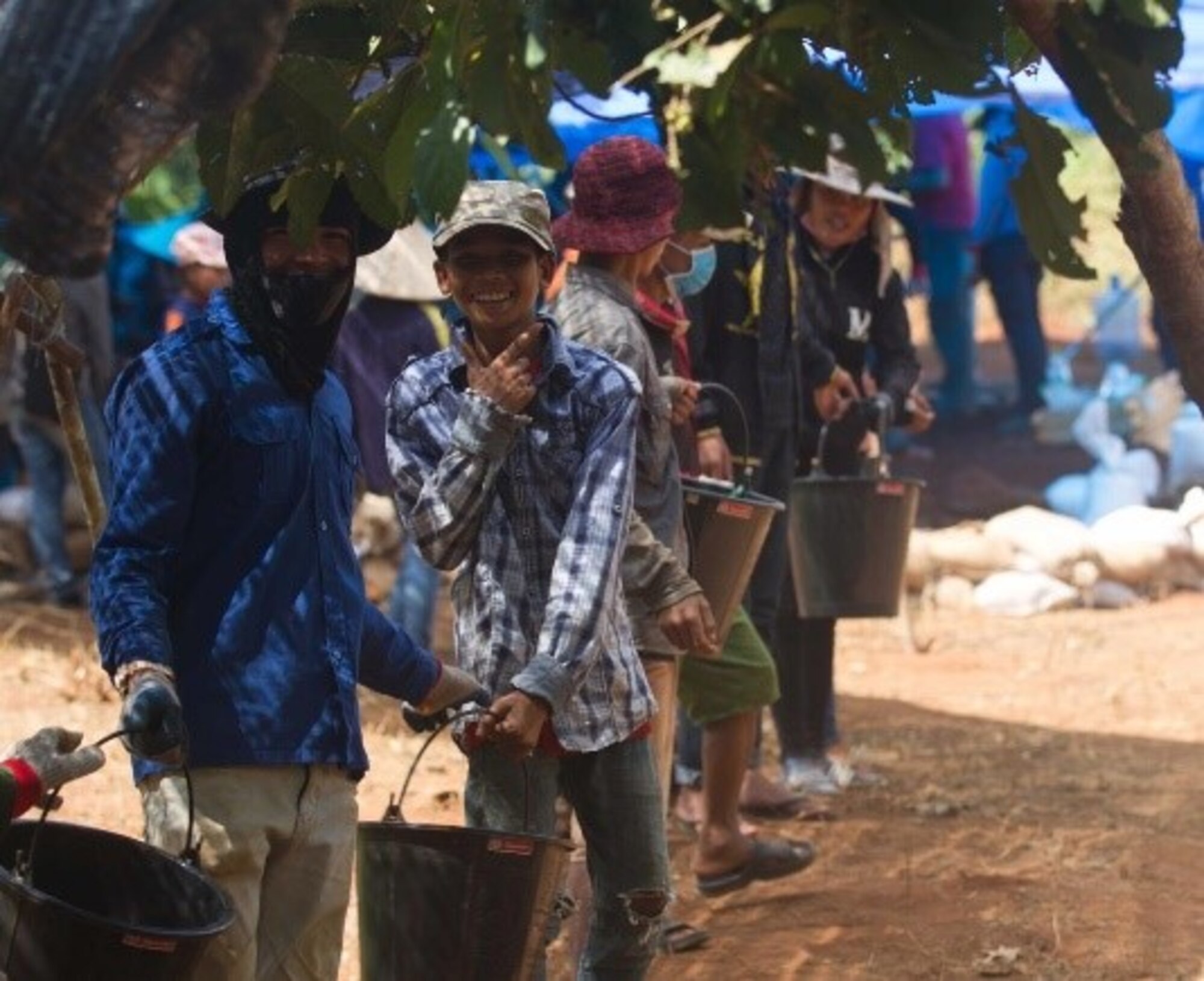 Americans and Lao workers dig at Vietnam War Era f-4 crash in search of two missing in action pilots, Savannakhét Province, Laos, July 15 2019.