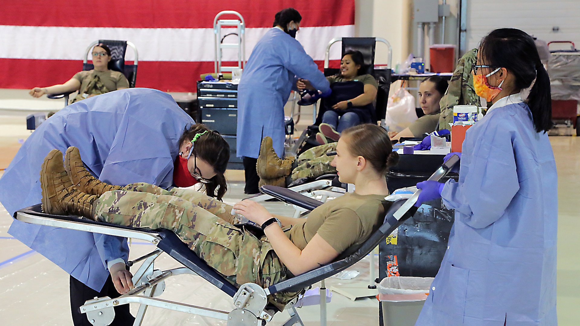 Alaska Department of Military and Veterans Affairs personnel, including National Guardsmen, members of the State Defense Force, and state employees, donate blood to the Blood Bank of Alaska at a mobile center set up in the Guard armory on Joint Base Elmendorf-Richardson, May 26, 2020. Blood donation is essential for hospitals to be able to take care of those who need it. The demand for blood products (blood, platelets and plasma) is constant, even when the world isn’t in the midst of a global pandemic. (U.S. Army National Guard photo by Sgt. Seth LaCount/Released)