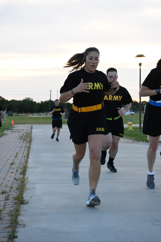 Alaska Army National Guard Staff Sergeant Bethany Hendren completes her 100 mile challenge at Fort Hood, Texas, May 22, 2020. She accepted this challenge from Sergeant 1st. Class Adam Mcquiston currently stationed in Germany, as part of the Better Opportunities for Single Soldiers fitness program. (U.S. Army National Guard Photo by SGT Heidi Kroll)
