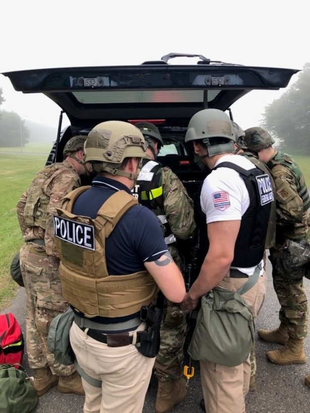 Office of Special Investigations Special Agents plan a response with the 35th Security Forces Squadron after an exercise attack on Misawa Air Base, Japan, during PACIFIC RONIN Aug. 23-28, 2020. (Photo by SA Brian Fitch, OSI Det. 623)