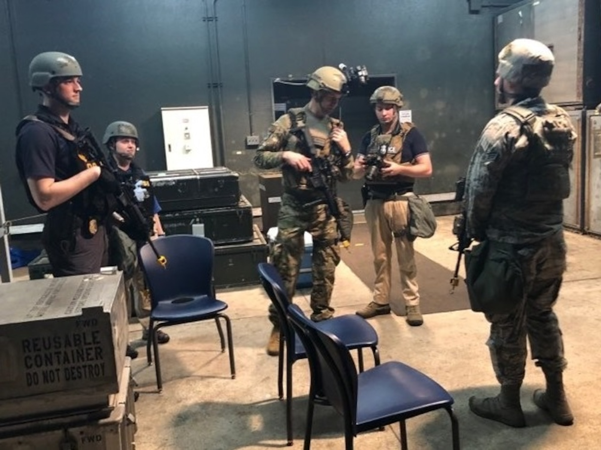 Office of Special Investigations Detachment 623 Special Agents debrief with the 35th Security Forces as they search for a suspicious individual during Exercise PACIFIC RONIN at Misawa Air Base, Japan, Aug. 23-28, 2020. (Photo by SA Brian Fitch, OSI Det. 623)