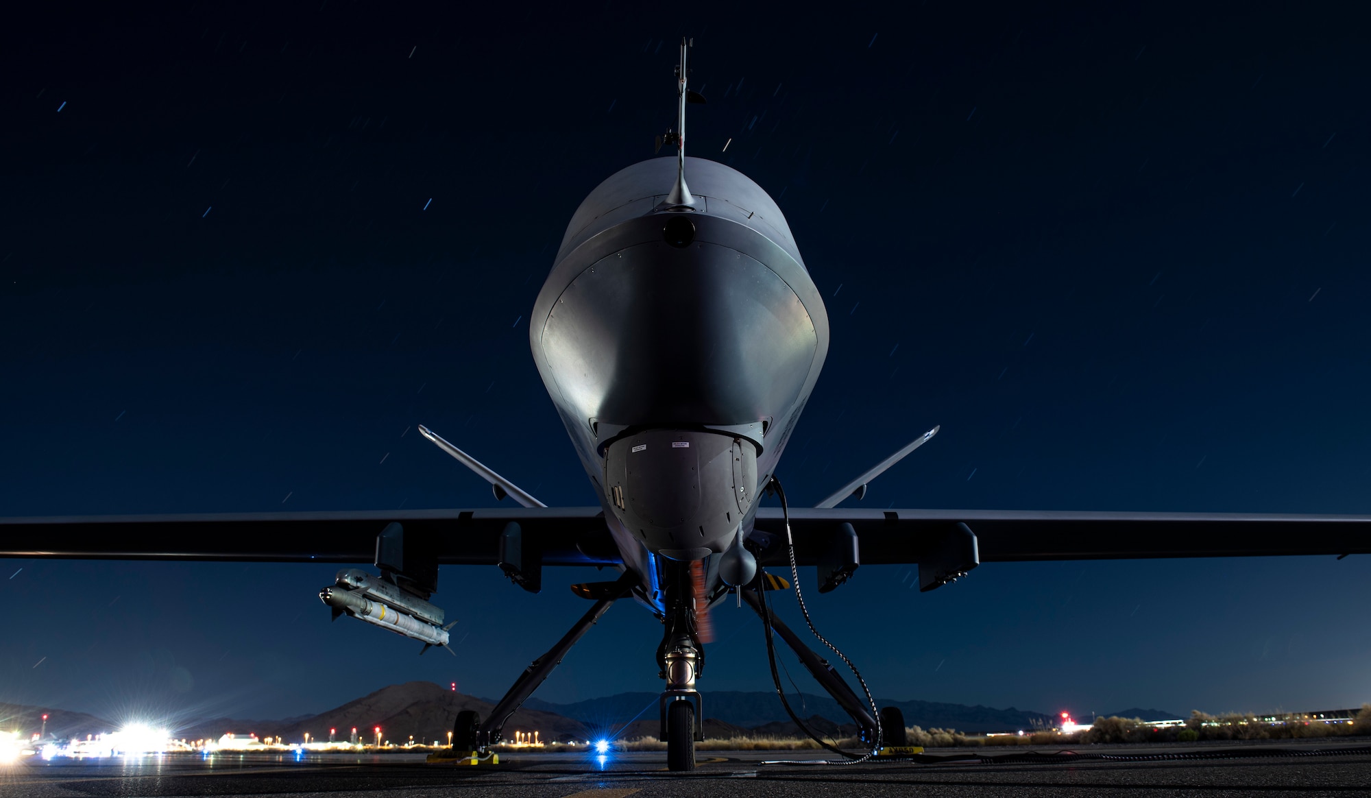 Image of an MQ-9 armed with an AIM-9X missile