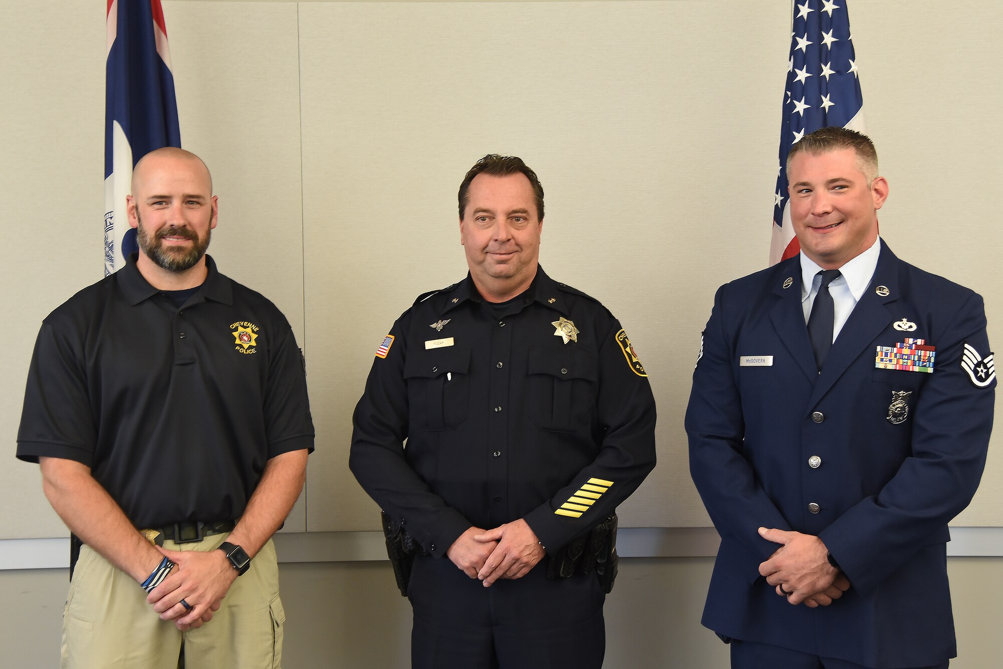 group photo of Chief Kozak and Sgt McGovern and Sgt Bentley