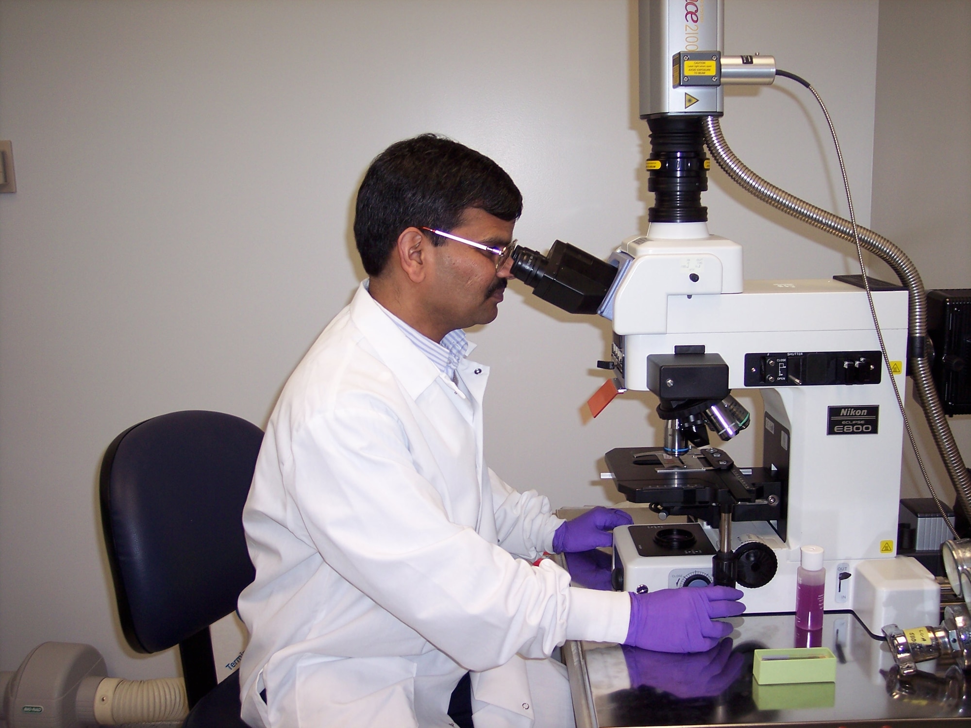 Air Force Research Laboratory scientist Dr. Saber Hussain views particle interaction with cultured cells. His work on the development of a model to identify the impact of stressors on Airmen is at the center of a Cooperative Research and Development Agreement that will establish a new laboratory facility at Wright State University.  (Courtesy photo)