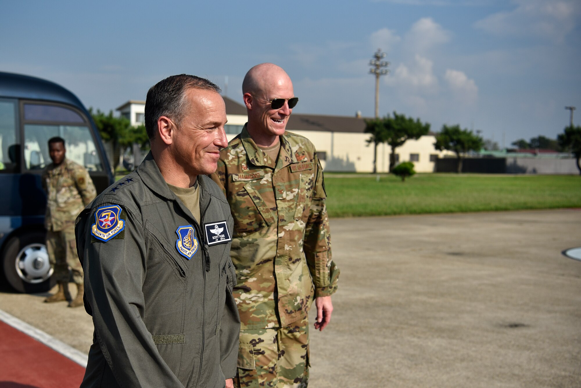 A photo of two commanders walking.