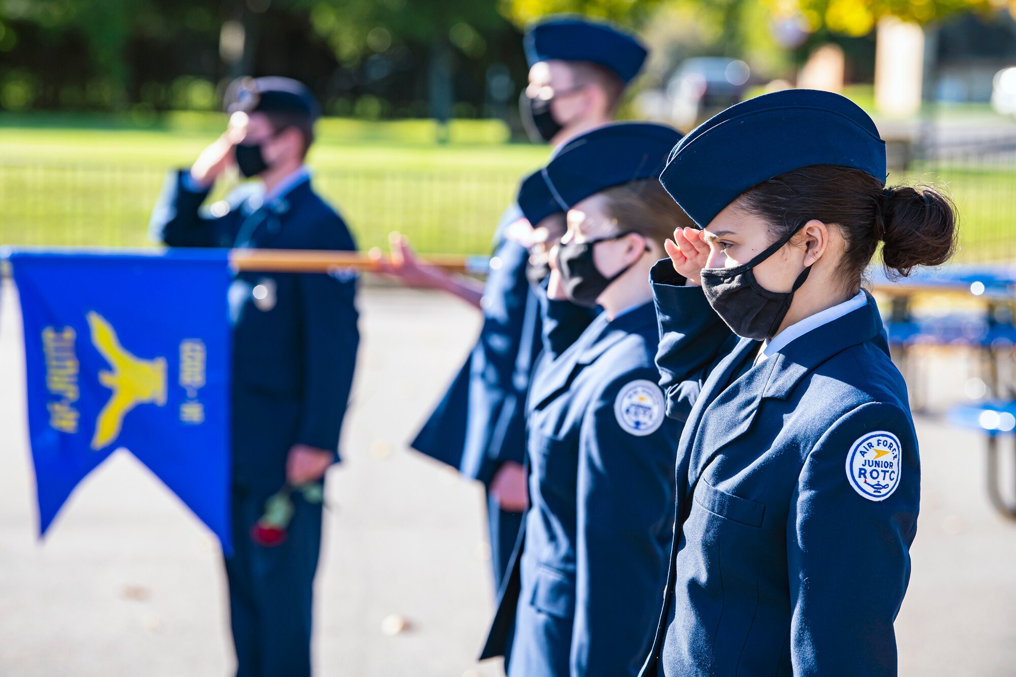 Cadets from the Alconbury Highschool JROTC along with Airmen from the 501st Combat Support Wing, salute during a 9/11 remembrance ceremony, Sep. 9, 2020 at RAF Alconbury, England. Airmen from the 501st Combat Support Wing and Cadets participated in the ceremony to honor those who lost their lives during the September 11th terrorist attacks. (U.S. Air Force photo by Senior Airman Eugene Oliver)