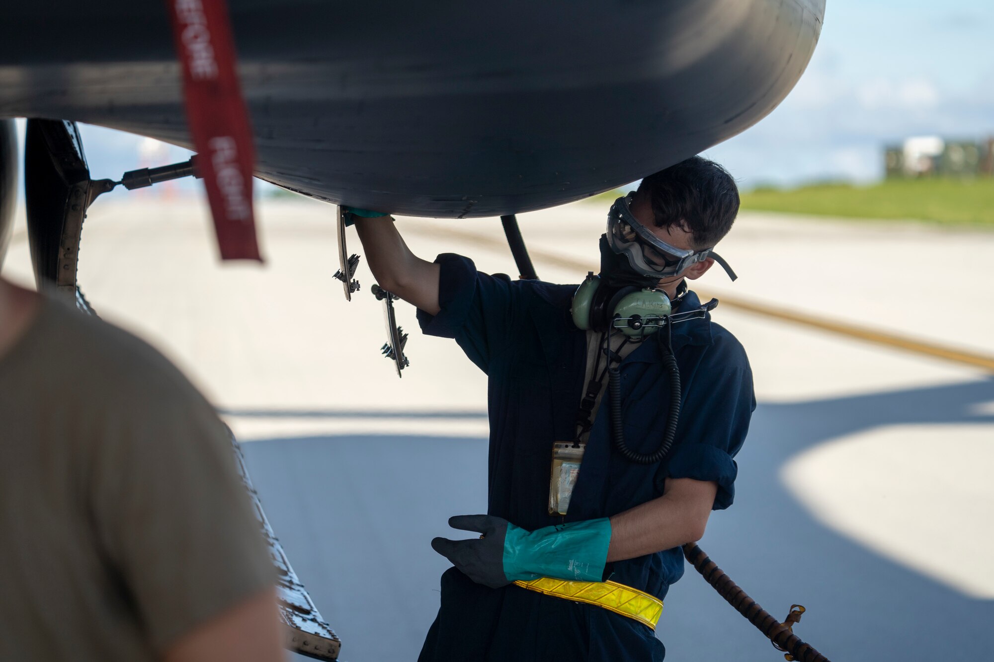 A maintainer assigned to the 34th Expeditionary Bomb Squadron conducts post-flight maintenance after a B-1B Lancer arrives at Andersen AFB, Guam, Sept. 10, 2020. Approximately 200 Airmen and four B-1s assigned to the 28th Bomb Wing at Ellsworth AFB, South Dakota, deployed to the Pacific in support of the Bomber Task Force employment model. The BTF is deployed to Andersen AFB to support Pacific Air Forces’ training efforts with allies, partners and joint forces; and strategic deterrence missions to reinforce the rules-based order in the Indo-Pacific region. (U.S. Air Force photo by 1st Lt. Joshua Sinclair)