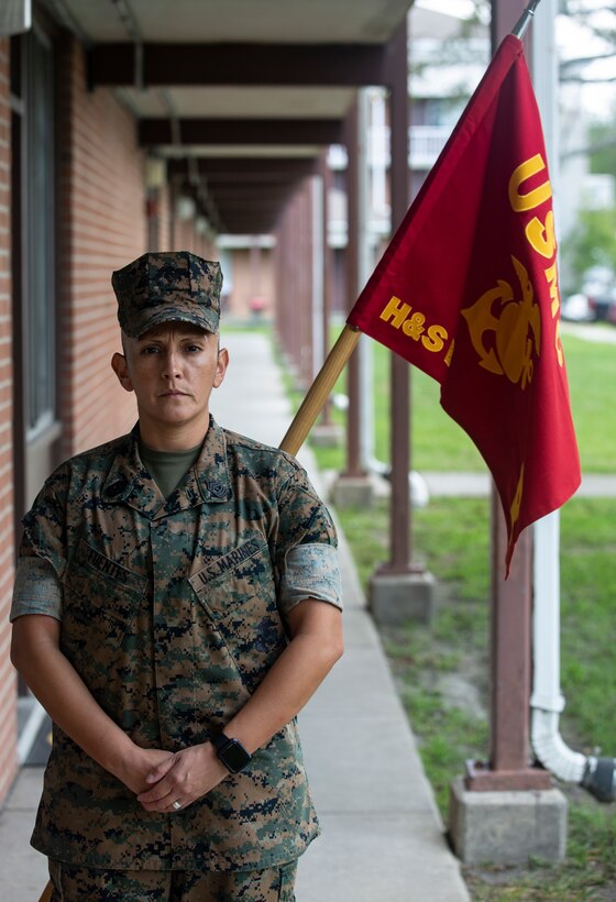 U.S. Marine Corps 1st Sgt. Esperanza Fuentes, first sergeant, Bravo Company, Headquarters and Support Battalion, Marine Corps Installations East-Marine Corps Base Camp Lejeune, poses in front of the Bravo Company barracks on Sept. 3, 2020. On Sept. 11, 2001, Fuentes was a Lance Cpl. Stationed at Camp Pendleton, California. That day the question on everyone’s minds was “are we deploying?” The answer, yes, would be one of the many things that led her to where she is now.  This year marks the 19th anniversary of Patriots Day, which honors the nearly 3,000 American citizens, civil servants, and first responders whose lives were taken as a result of the terrorist attacks that took place on Sept. 11, 2001.  (U.S. Marine Corps Photo by Lance Cpl. Isaiah Gomez)