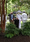 Each year ONI remembers eight ONI shipmates who lost their lives during the terrorist attack at the Pentagon on September 11, 2001. A commemoration ceremony is held in the Remembrance Garden of the National Maritime Intelligence Center. Capt. Tom Bortmes was ONI’s commanding officer when the attacks occurred and he has attended each remembrance ceremony since the first one was held in October 2001. Pictured here, Bortmes and ONI Commander Rear Adm. Kelly Aeschbach place a wreath in the garden where a marker bears the names and pictures of the Naval Intelligence professionals who passed that day: Cmdr. Dan Shanower, Lt. Cmdr. Vince Tolbert, Lt. Jonas Panik, Lt. Darin Pontell, Petty Officer 1st Class Julian Cooper, Angela Houtz, Brady Howell, and Gerry Moran. A bell tolled as each name was read.