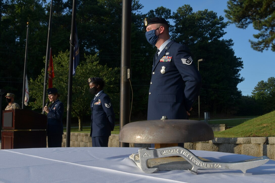 Airmen from the 94th Airlift Wing participate in a 9/11 Remembrance Ceremony at the POW/MIA Memorial at Dobbins Air Reserve Base, Ga. The ceremony included a moment of silence, command commentaries and an honor guard presentation. (U.S. Air Force photo by Senior Airman Shelby Thurman)