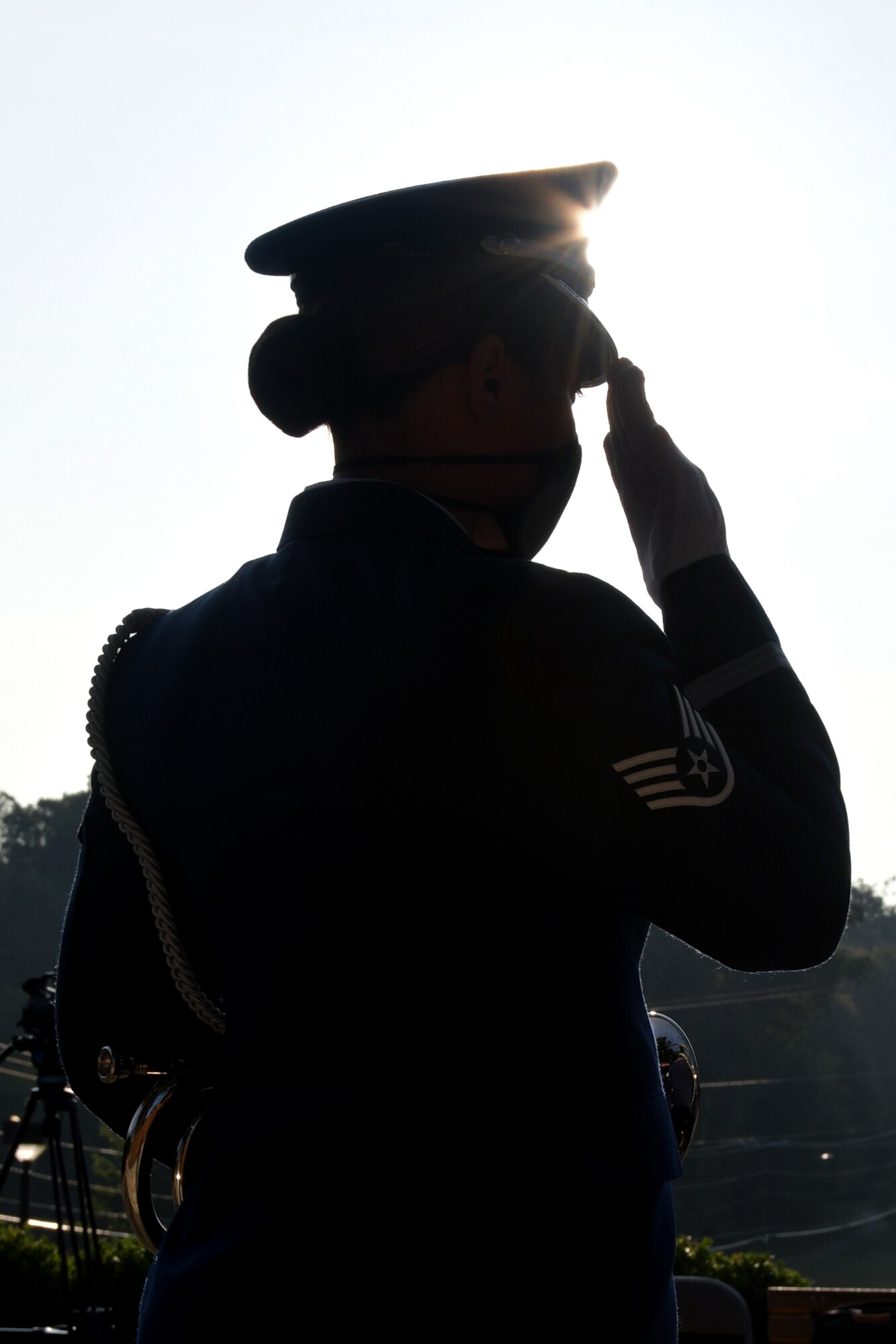 Staff Sgt. Vanessa Weaver, a member of the Dobbins Honor Guard, salutes at a 9/11 Remembrance Ceremony at the POW/MIA Memorial at Dobbins Air Reserve Base, Ga. The ceremony included a moment of silence, command commentaries and an honor guard presentation. (U.S. Air Force photo by Senior Airman Shelby Thurman)