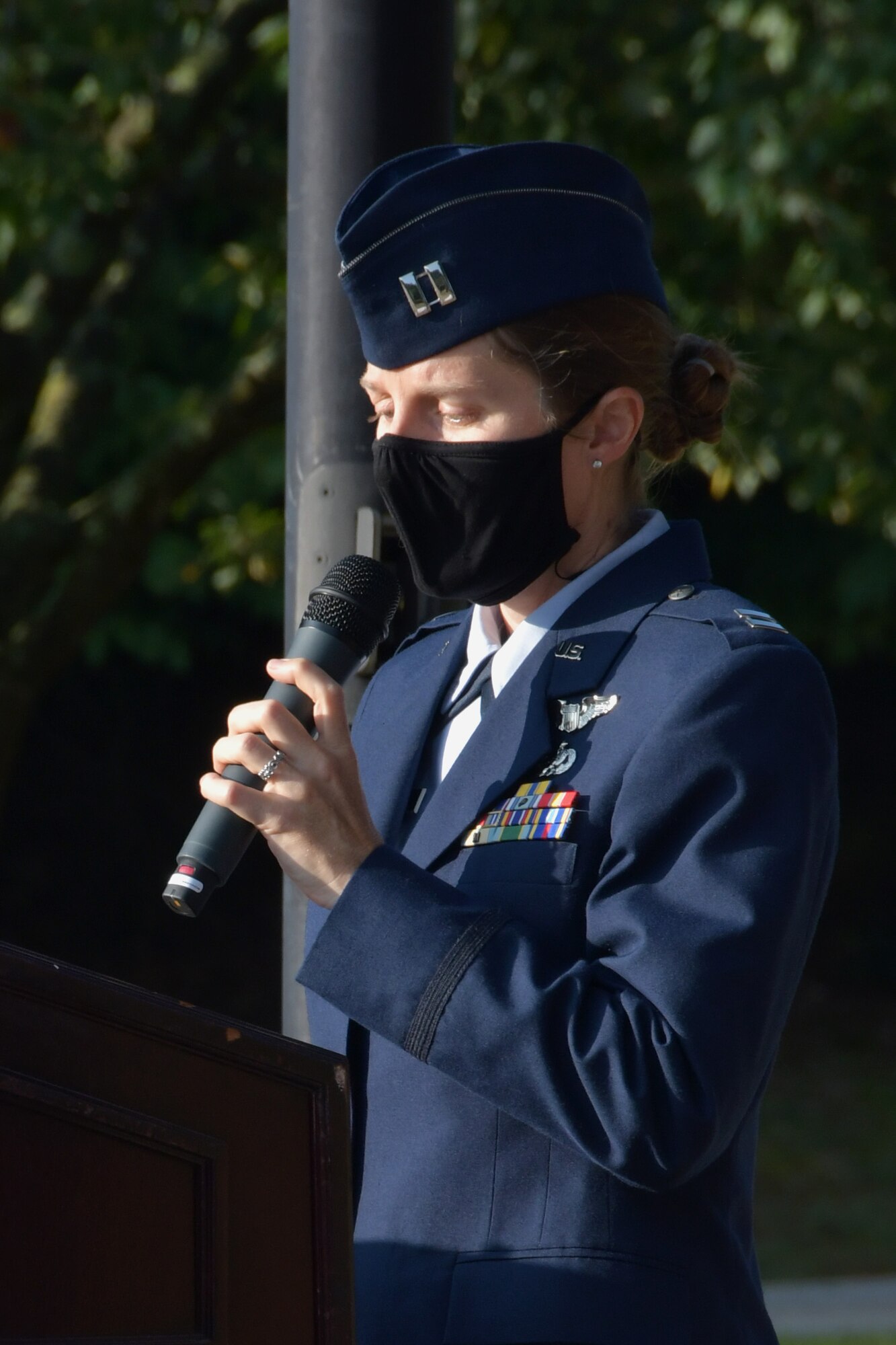 Capt. Latessa Meader, 700th Airlift Squadron pilot, speaks at a 9/11 Remembrance Ceremony at the POW/MIA Memorial at Dobbins Air Reserve Base, Ga. The ceremony included a moment of silence, command commentaries and an honor guard presentation. (U.S. Air Force photo by Senior Airman Shelby Thurman)