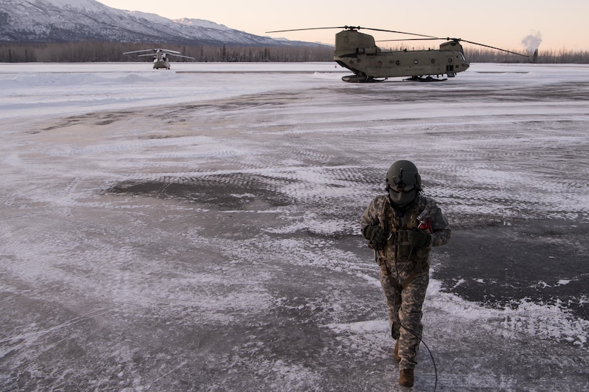 U.S. Army Staff Sgt. Jeremy Maddox assigned to the 2nd Battalion, 211th Aviation Regiment, conducts ramp and cabin checks before takeoff of a CH-47 Chinook on Feb. 24, 2020, at Joint Base Elmendorf-Richardson, Alaska. The Alaska National Guard is hosting Exercise Arctic Eagle 2020, a joint-training exercise, Feb. 20 to March 6, 2020 throughout Alaska, including Joint Base Elmendorf-Richardson, Eielson Air Force Base, Fort Wainwright, the Yukon-Kuskokwim Delta and as far north as Teshekpuk Lake. As a homeland security and emergency response exercise, Arctic Eagle 20 is designed to increase the National Guard’s ability and effectiveness to operate in the extreme cold-weather conditions found in Arctic environments. (U.S. Air Force photo by Tech. Sgt. Amy Picard)