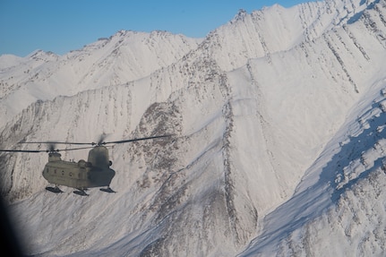 U.S. Soldiers with the Alaska Air National Guard assigned to the 2nd Battalion, 211th Aviation Regiment, takes flight en route from Joint Base Elmendorf-Richardson to Deadhorse, Alaska, in a CH-47 Chinook for exercise Arctic Eagle on Feb. 24, 2020. The Alaska National Guard is hosting Exercise Arctic Eagle 2020, a joint-training exercise, Feb. 20 to March 6, 2020, throughout Alaska, including Joint Base Elmendorf-Richardson, Eielson Air Force Base, Fort Wainwright, the Yukon-Kuskokwim Delta and as far north as Teshekpuk Lake. As a homeland security and emergency response exercise, Arctic Eagle 20 is designed to increase the National Guard’s ability and effectiveness to operate in the extreme cold-weather conditions found in Arctic environments. (U.S. Air Force photo by Tech. Sgt. Amy Picard)